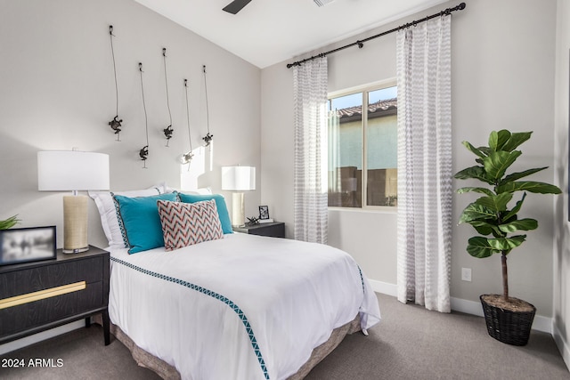 bedroom featuring ceiling fan and carpet flooring