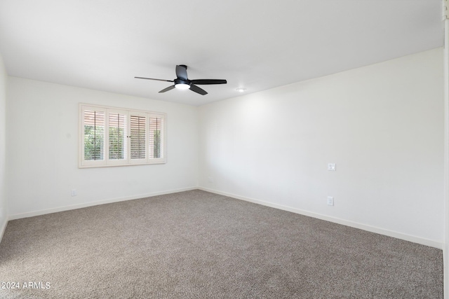 unfurnished room with carpet floors and ceiling fan