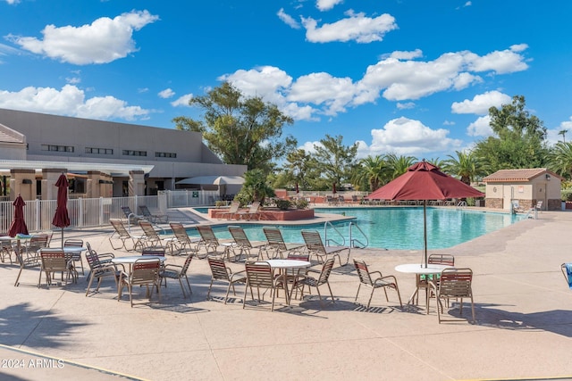 view of swimming pool featuring a patio area