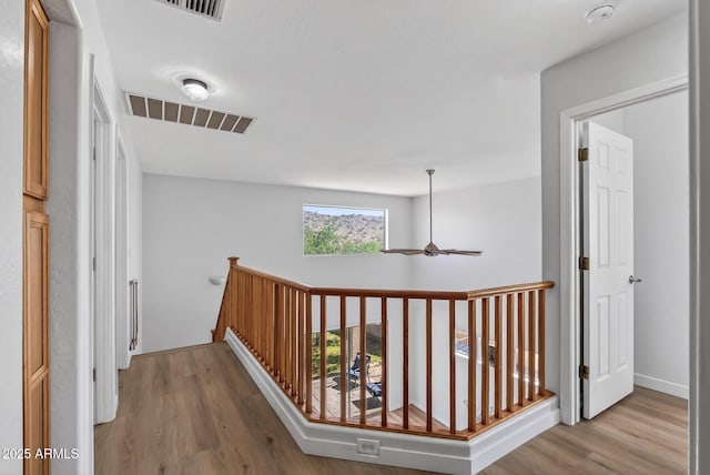 18132 W Cardinal Dr, Goodyear, AZ 85338 - hall featuring an upstairs landing and wood finished floors