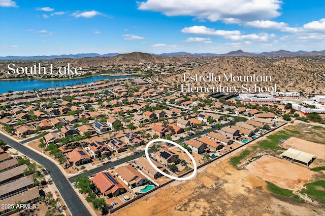 18132 W Cardinal Dr, Goodyear, AZ 85338 - aerial view of residential area featuring a water and mountain view