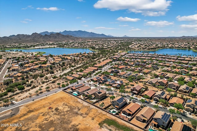 18132 W Cardinal Dr, Goodyear, AZ 85338 - aerial perspective of suburban area featuring a water and mountain view