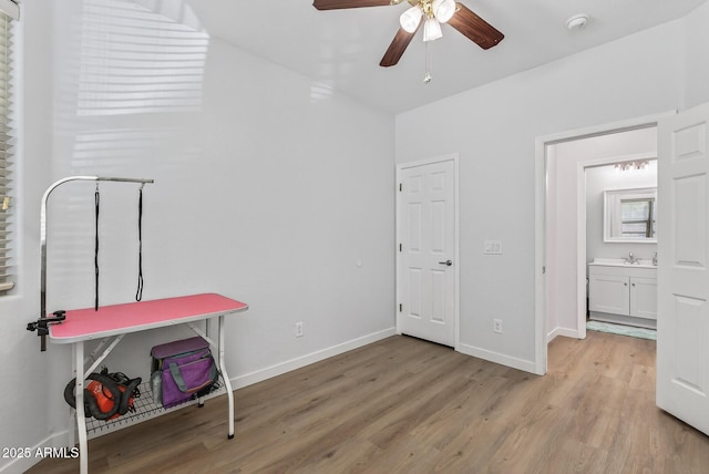18132 W Cardinal Dr, Goodyear, AZ 85338 - unfurnished bedroom with light wood-type flooring and ceiling fan