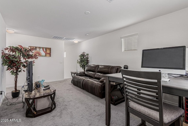 living area with carpet and visible vents