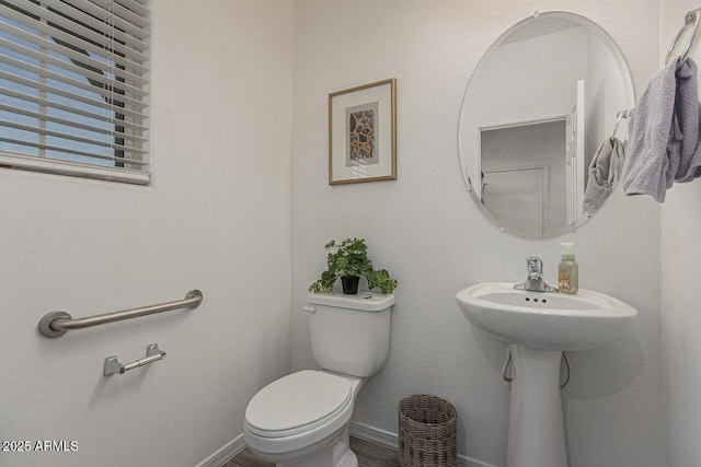 bathroom featuring toilet