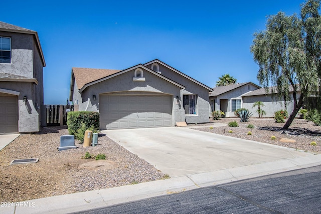 single story home featuring a garage