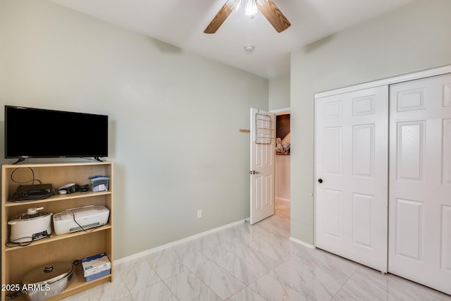 bedroom featuring a closet and ceiling fan