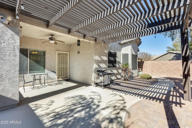 view of patio / terrace featuring ceiling fan, a pergola, and a grill