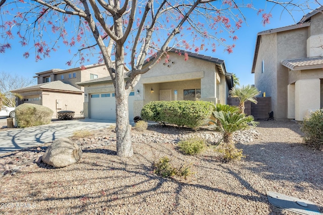 view of front of property featuring a garage