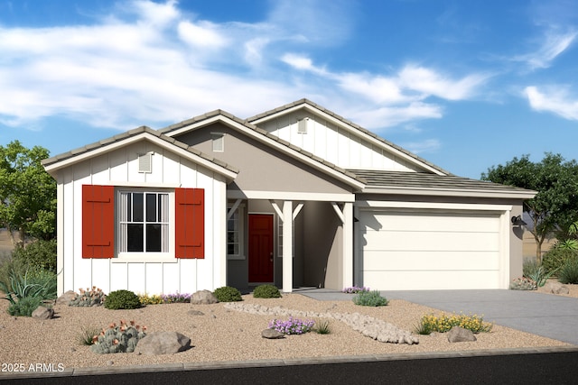 6091 N Sunrise Ln, Buckeye, AZ 85396 - view of front facade with board and batten siding, a tile roof, driveway, and a garage