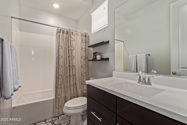 full bathroom featuring vanity, toilet, and shower / tub combo with curtain