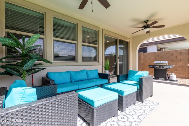 view of patio / terrace featuring an outdoor hangout area, ceiling fan, a grill, and fence