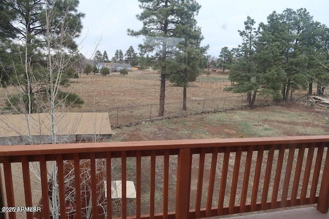wooden deck featuring fence