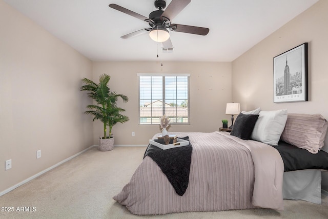 bedroom with light carpet, baseboards, visible vents, and ceiling fan