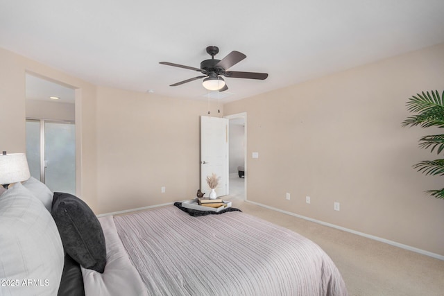 bedroom with baseboards, a ceiling fan, and light colored carpet