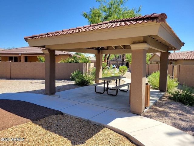 view of patio / terrace with fence and a gazebo