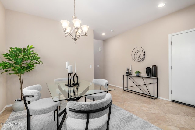 dining space with baseboards, recessed lighting, and an inviting chandelier