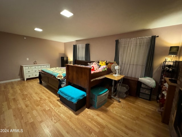 bedroom with light hardwood / wood-style floors