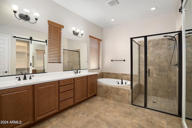 bathroom with vanity and separate shower and tub