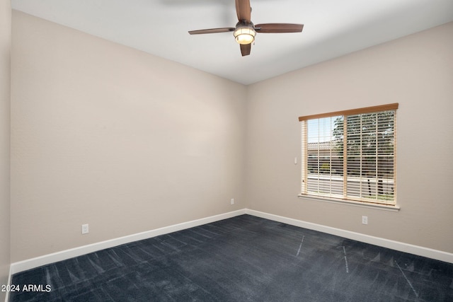 empty room featuring carpet flooring and ceiling fan