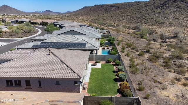 birds eye view of property featuring a mountain view