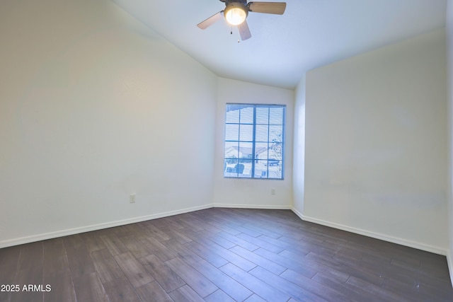 empty room featuring ceiling fan and lofted ceiling