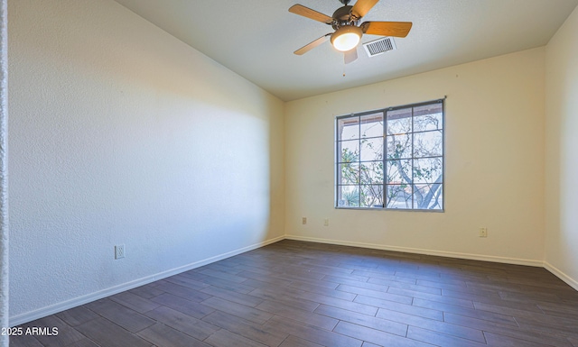 spare room featuring ceiling fan and vaulted ceiling