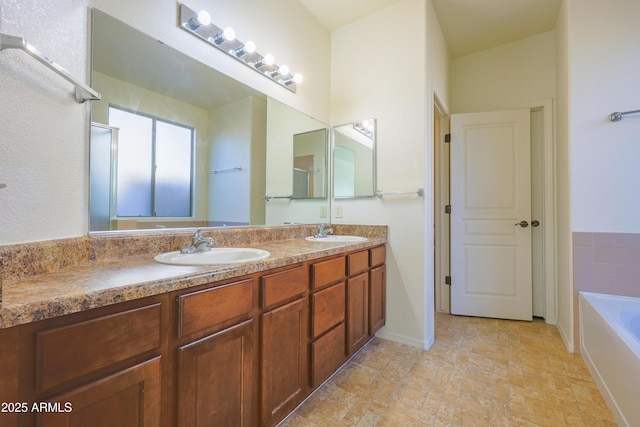 bathroom featuring vanity and a bathing tub