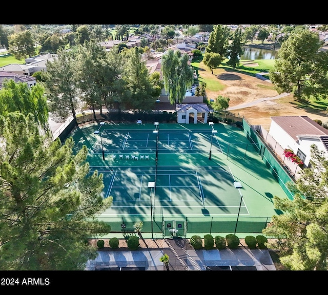 birds eye view of property featuring a water view