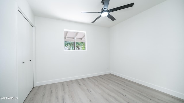 unfurnished room with light hardwood / wood-style floors and ceiling fan