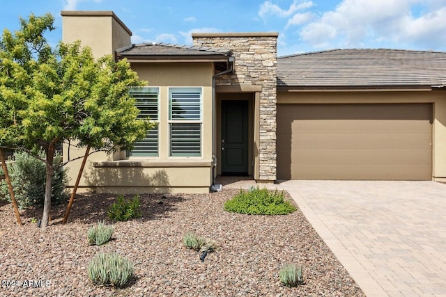 view of front of property featuring a garage