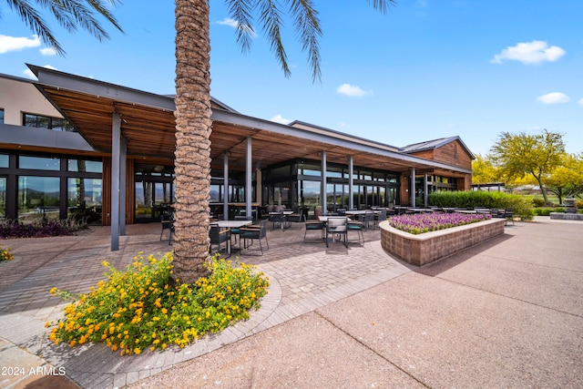 surrounding community with a patio area