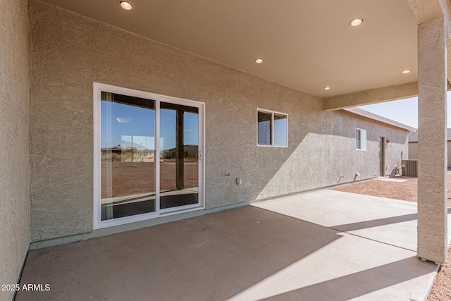 view of patio with cooling unit