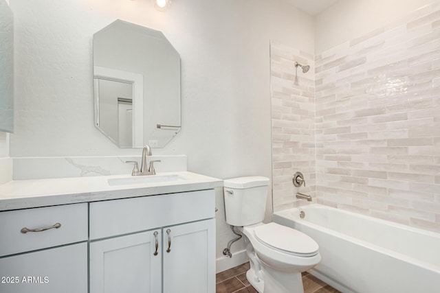 full bathroom with toilet, vanity, and tiled shower / bath combo