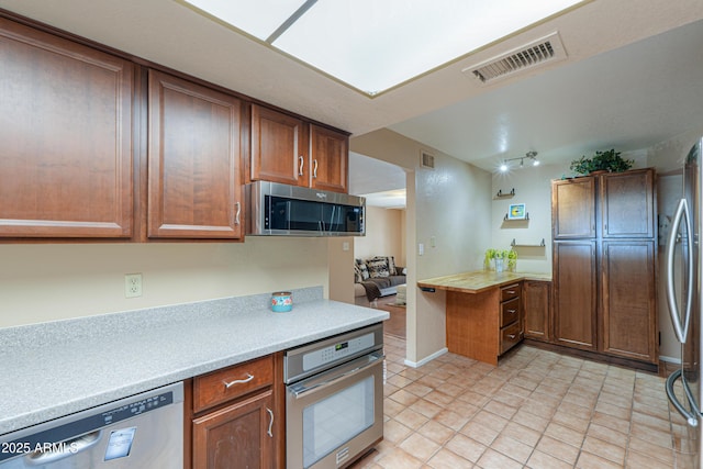 kitchen with appliances with stainless steel finishes