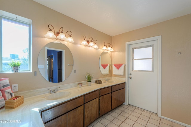 bathroom with vanity and tile patterned flooring