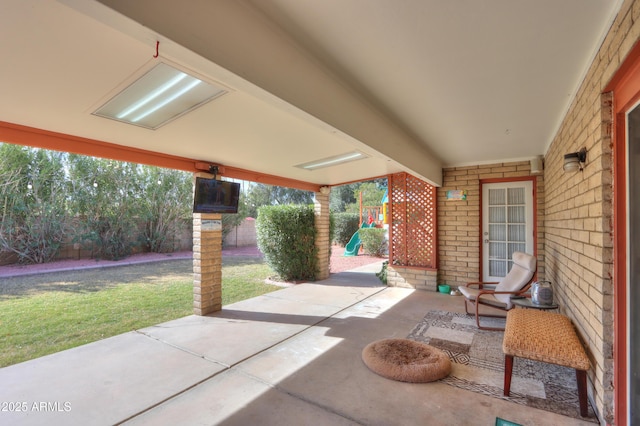 view of patio with a playground