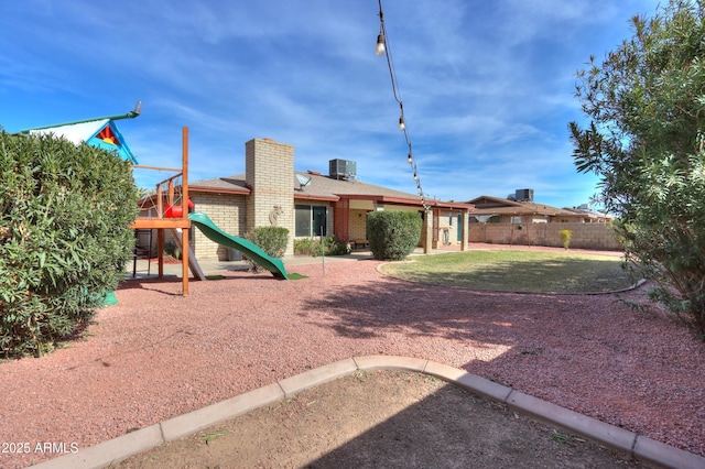 view of yard with a playground and cooling unit