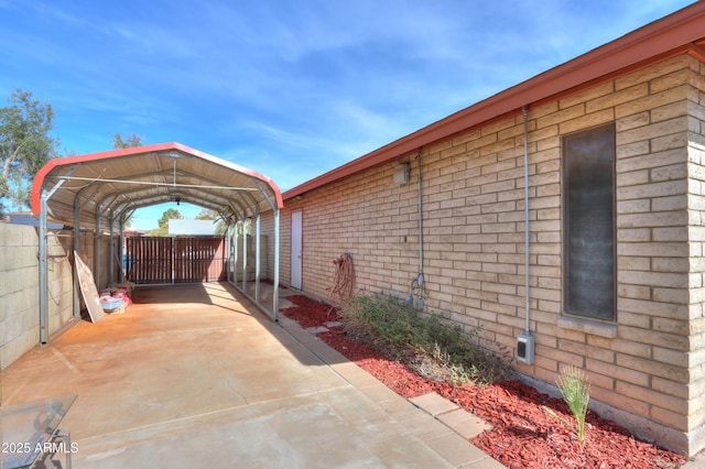 exterior space featuring a carport