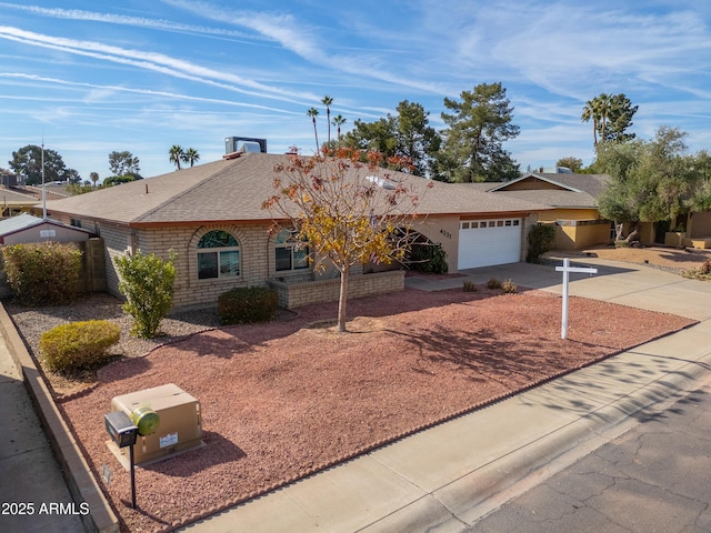 single story home with a garage