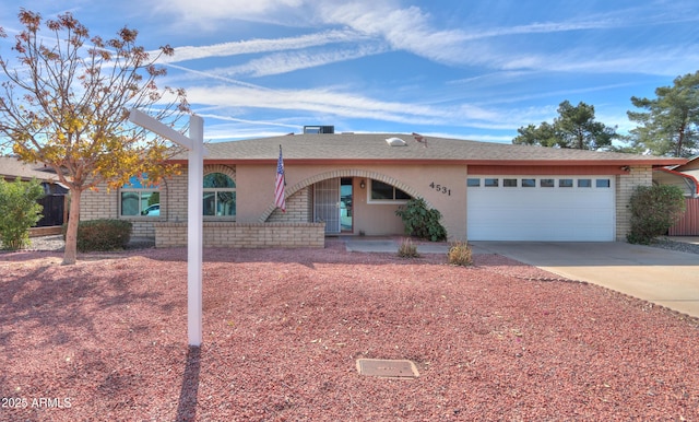 single story home featuring a garage