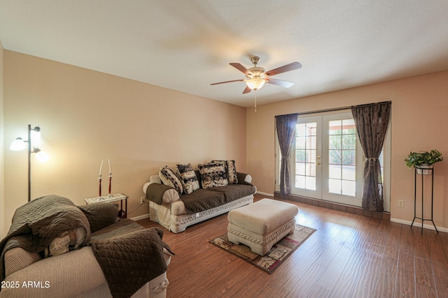 living room with french doors, ceiling fan, and dark hardwood / wood-style floors