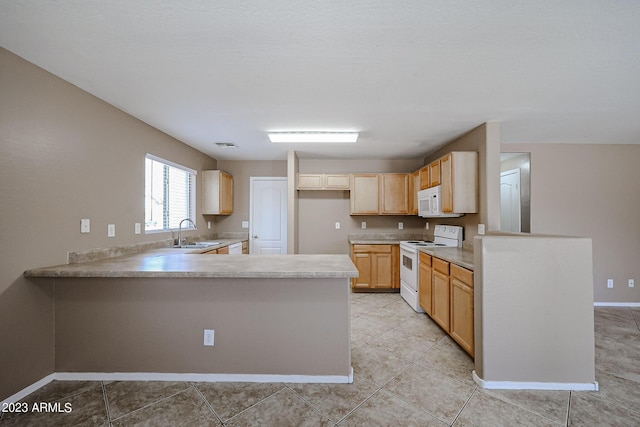 kitchen featuring kitchen peninsula, white appliances, sink, light brown cabinets, and light tile patterned floors