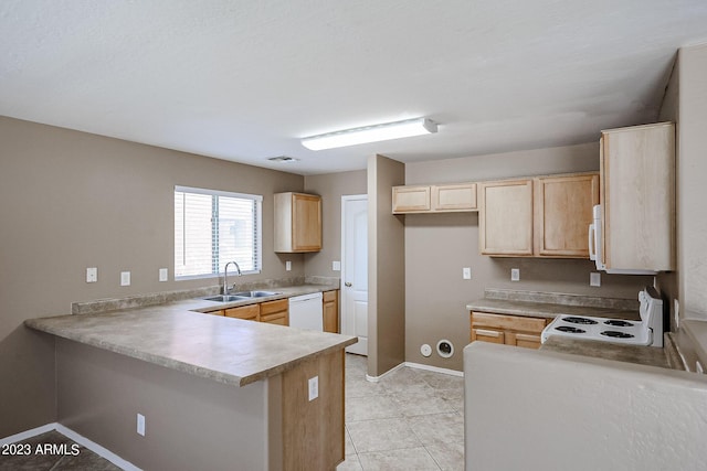 kitchen with light brown cabinets, white appliances, sink, light tile patterned floors, and kitchen peninsula