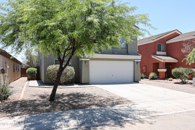 view of front of property with a garage