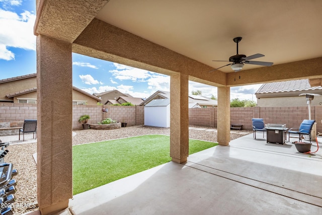 view of patio / terrace featuring a fenced backyard and a ceiling fan