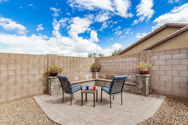 view of patio featuring a fenced backyard