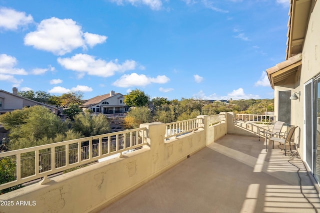 view of patio with a balcony