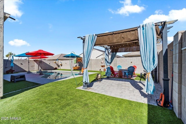 view of yard featuring a pergola, a swimming pool, and a patio