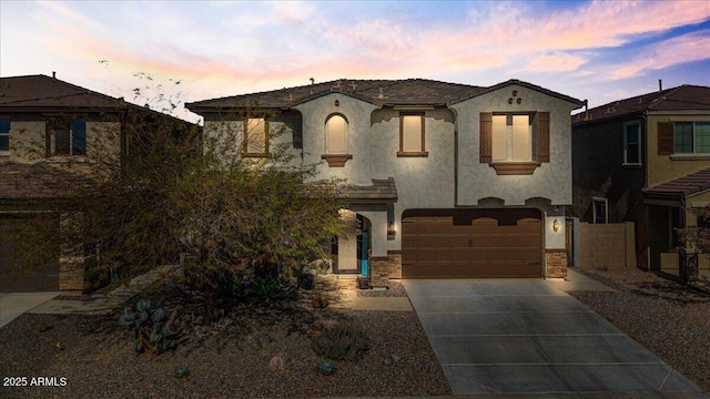 view of front of property with a garage